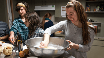 Food Science Students cooking in a kitchen lab