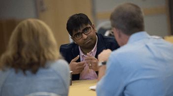 mentorship in action with a professor chatting with students