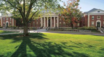 A wide-angle shot of the Waterman Building and Waterman Green on a beautiful day.