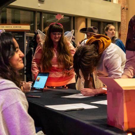 A UPB worker tabling during the Candy Shoppe halloween event at the davis center