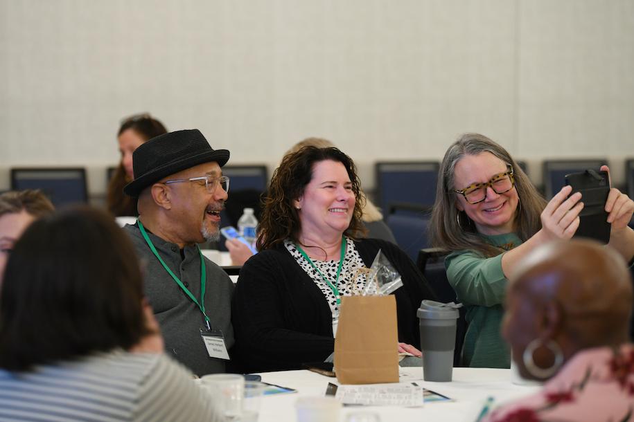 Conference attendees enjoy time bonding with each other.