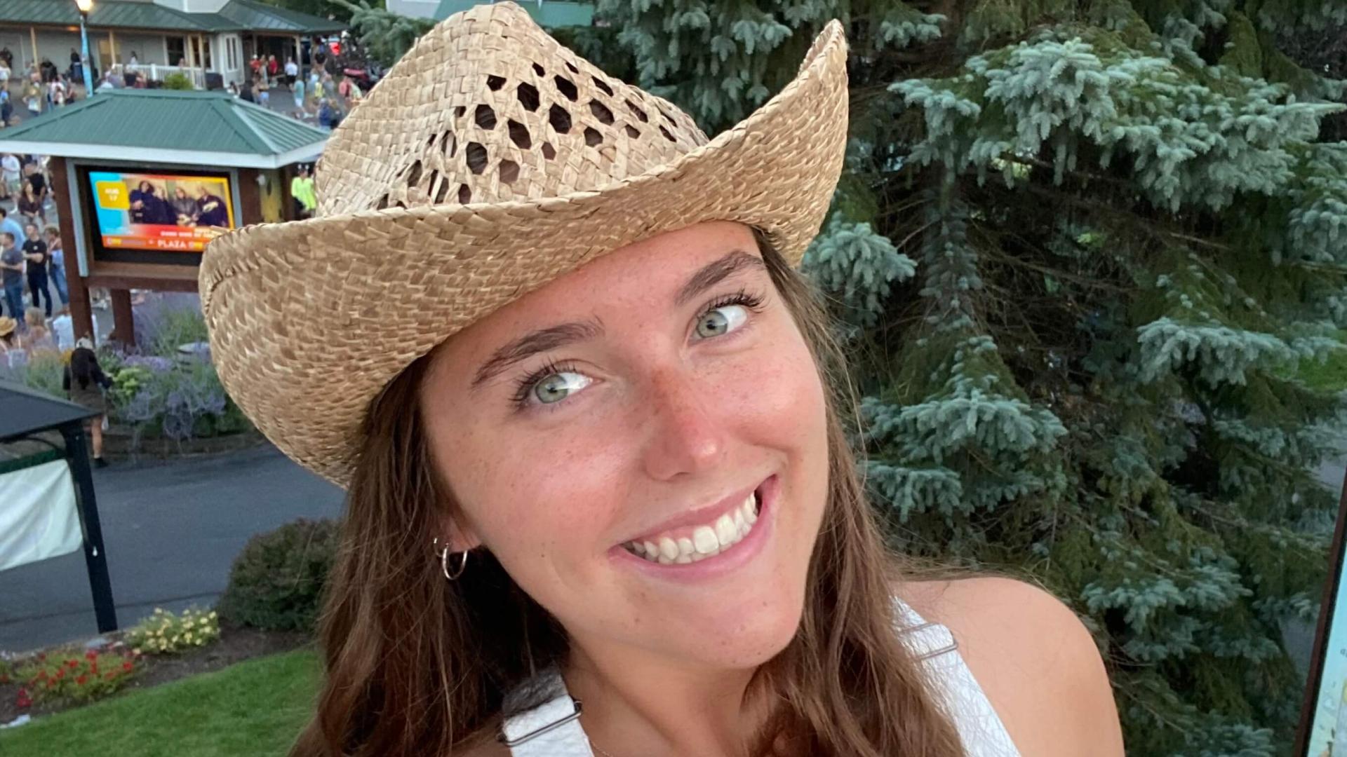 Chloe in a straw cowboy hat.