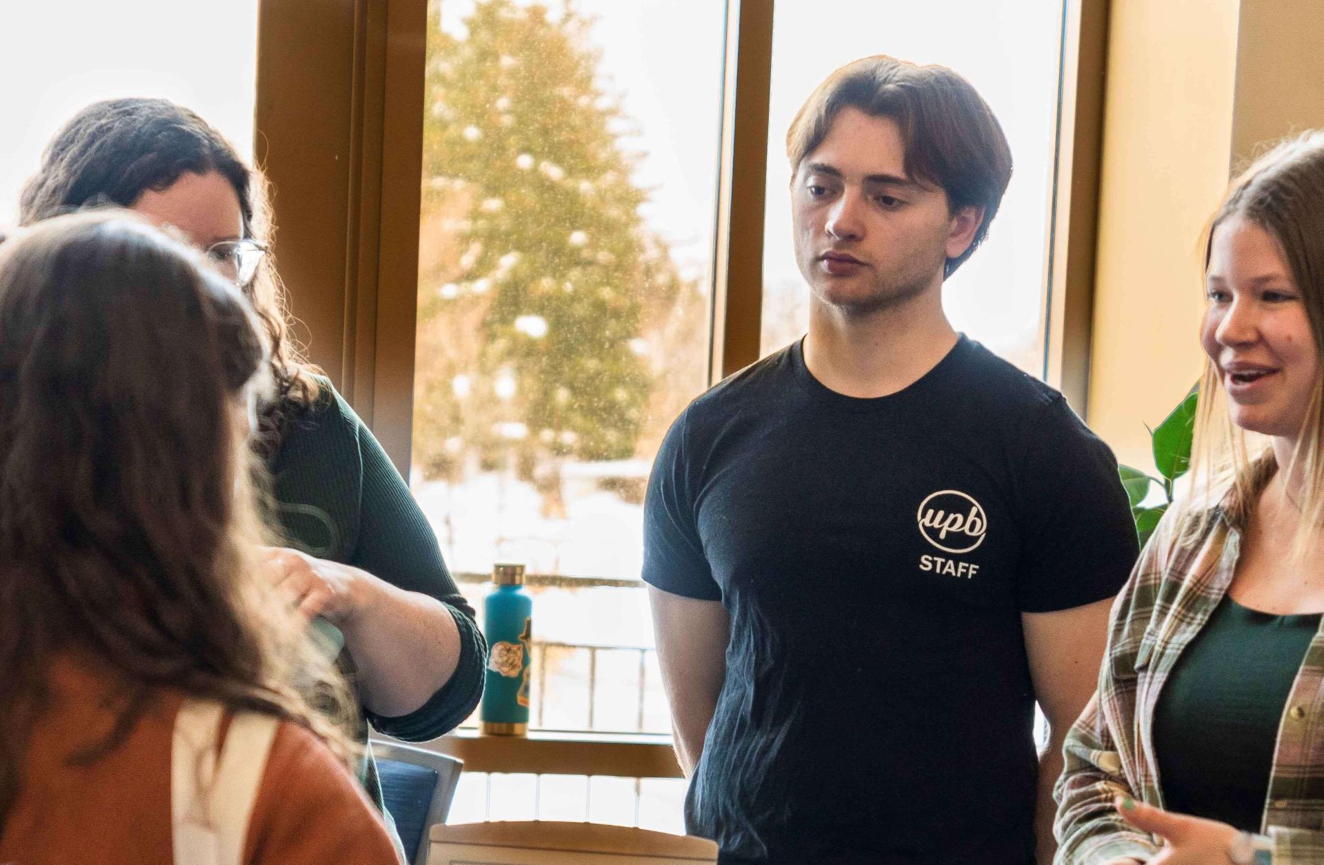 Photo of a student inquiring about a position at student life