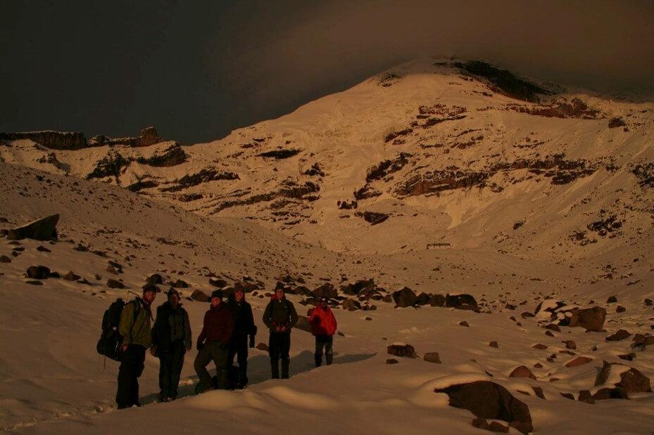 hiking over snowy mountains