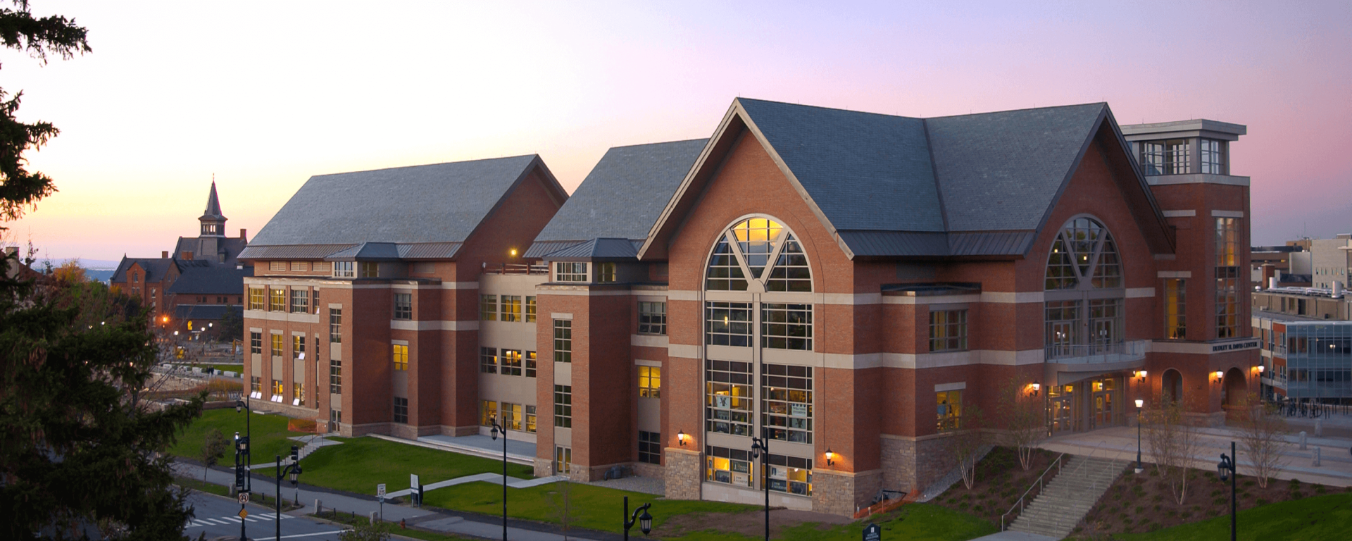 Photo of the Davis Center exterior at sunset