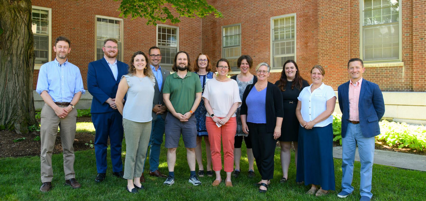 EDLP docotoral program cohort standing together outside of Waterman Building