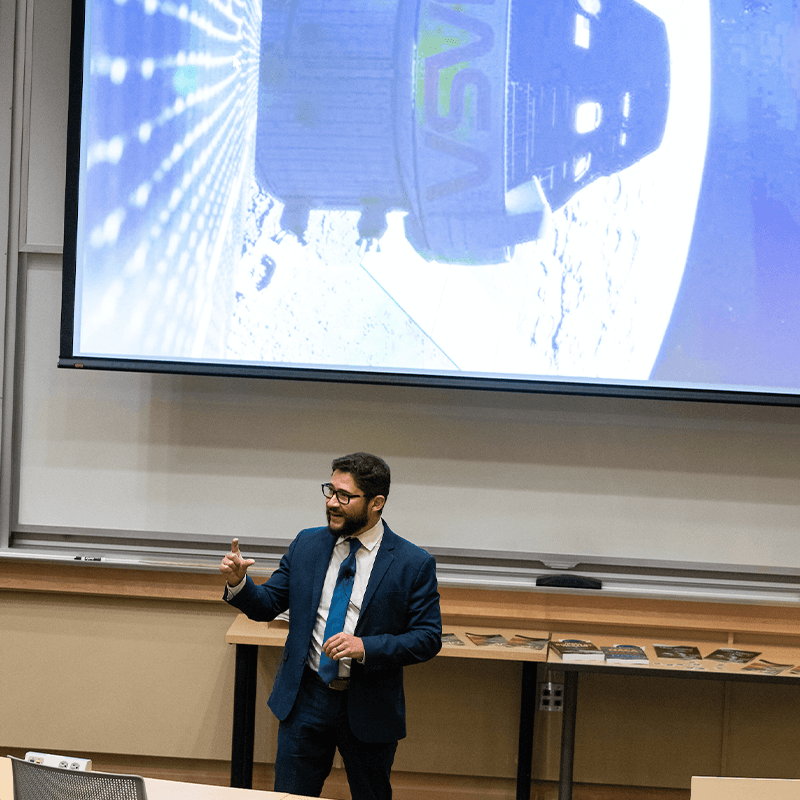 Scientist explaining how to do cancer research in space.
