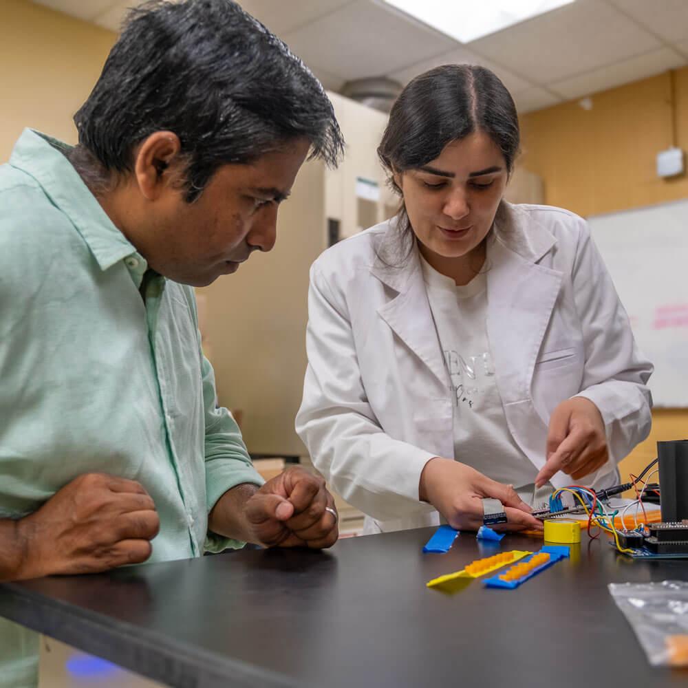 CEE Proferssor Raju Badireddy works with post-doctoral student