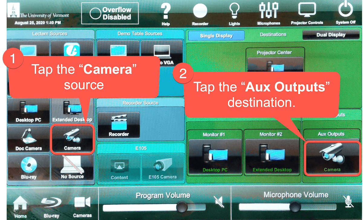 Touch panel display indication the "Camera" source button and "Aux Outputs" destination button