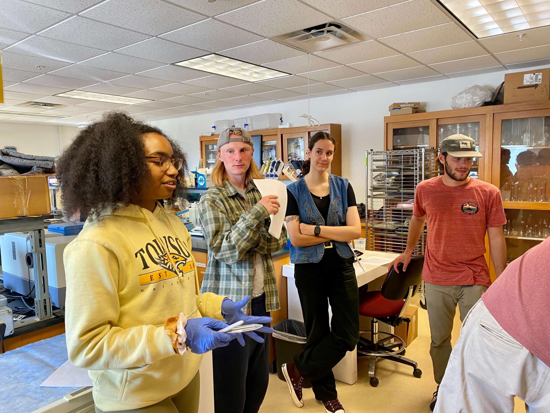 Students having a discussion in a lab