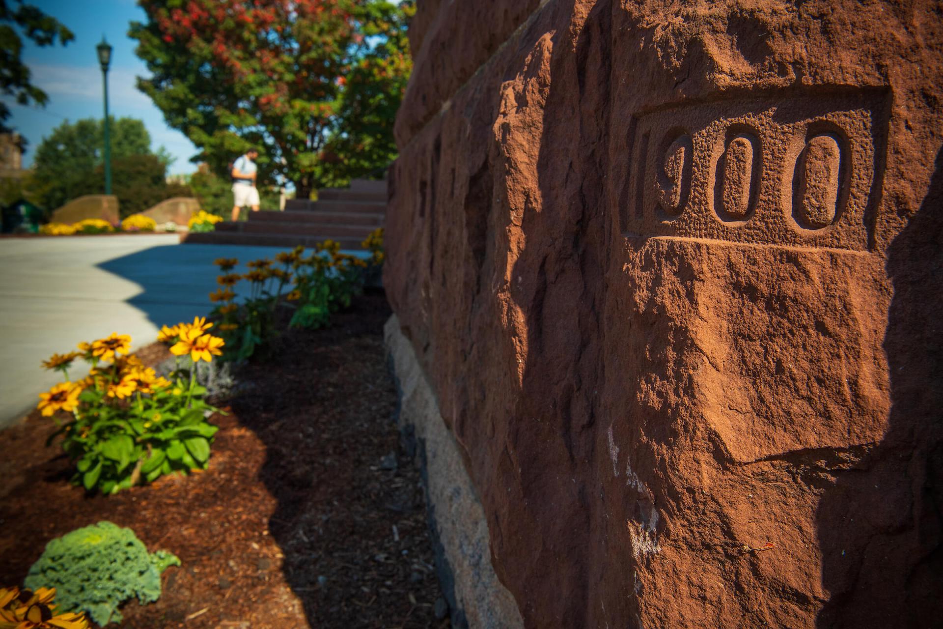 A detailed photo of red stone on UVM's campus