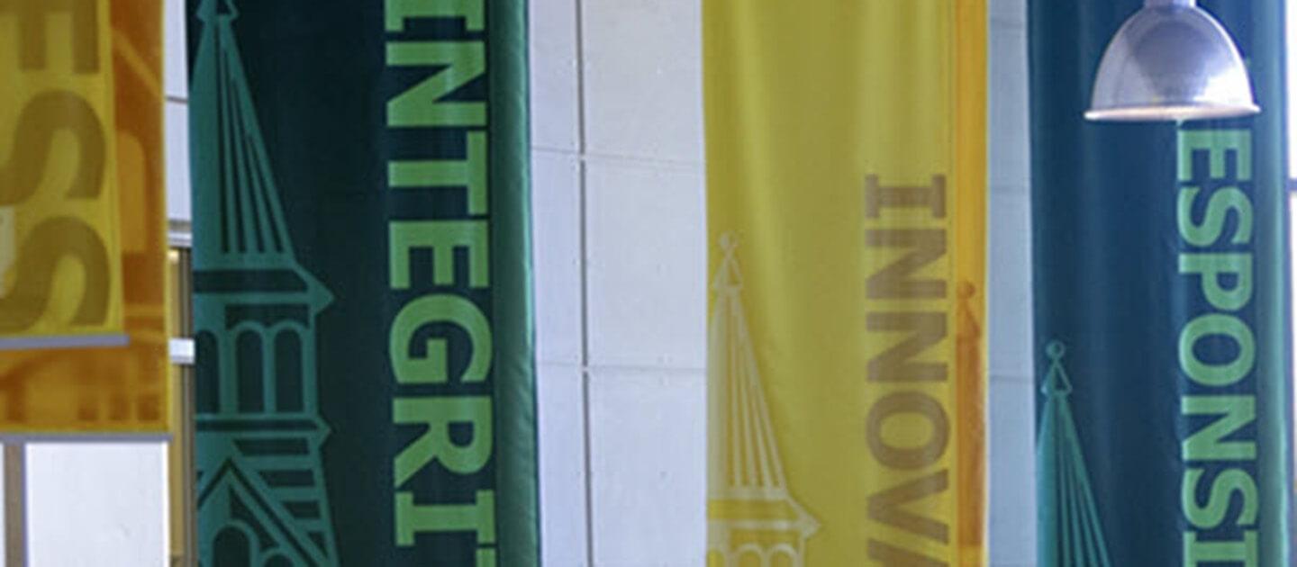 Banners with the words integrity and innovation.