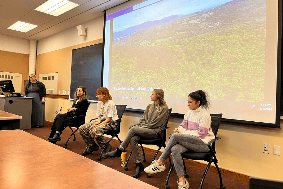 Panelists at the front of a conference room during a talk hosted by the Inclusive Arts Initiative