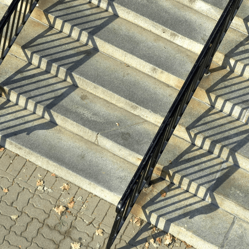 abstract shadows cast on granite steps