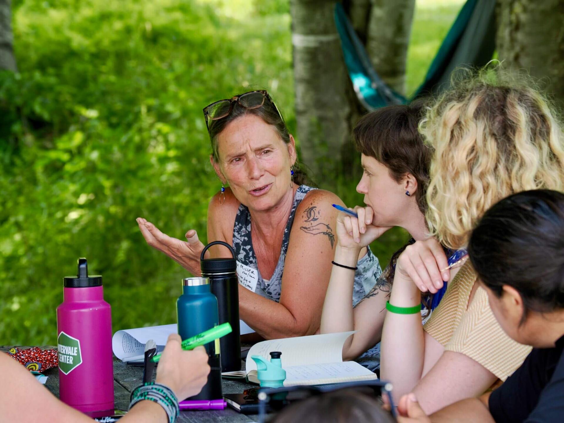 Fran Miller, senior staff attorney and adjunct faculty member at the Center for Agriculture and Food Systems (CAFS) at Vermont Law School (VLS), speaks with Katie Horner (center), Postdoctoral Associate at the UVM Institute for Agroecology.