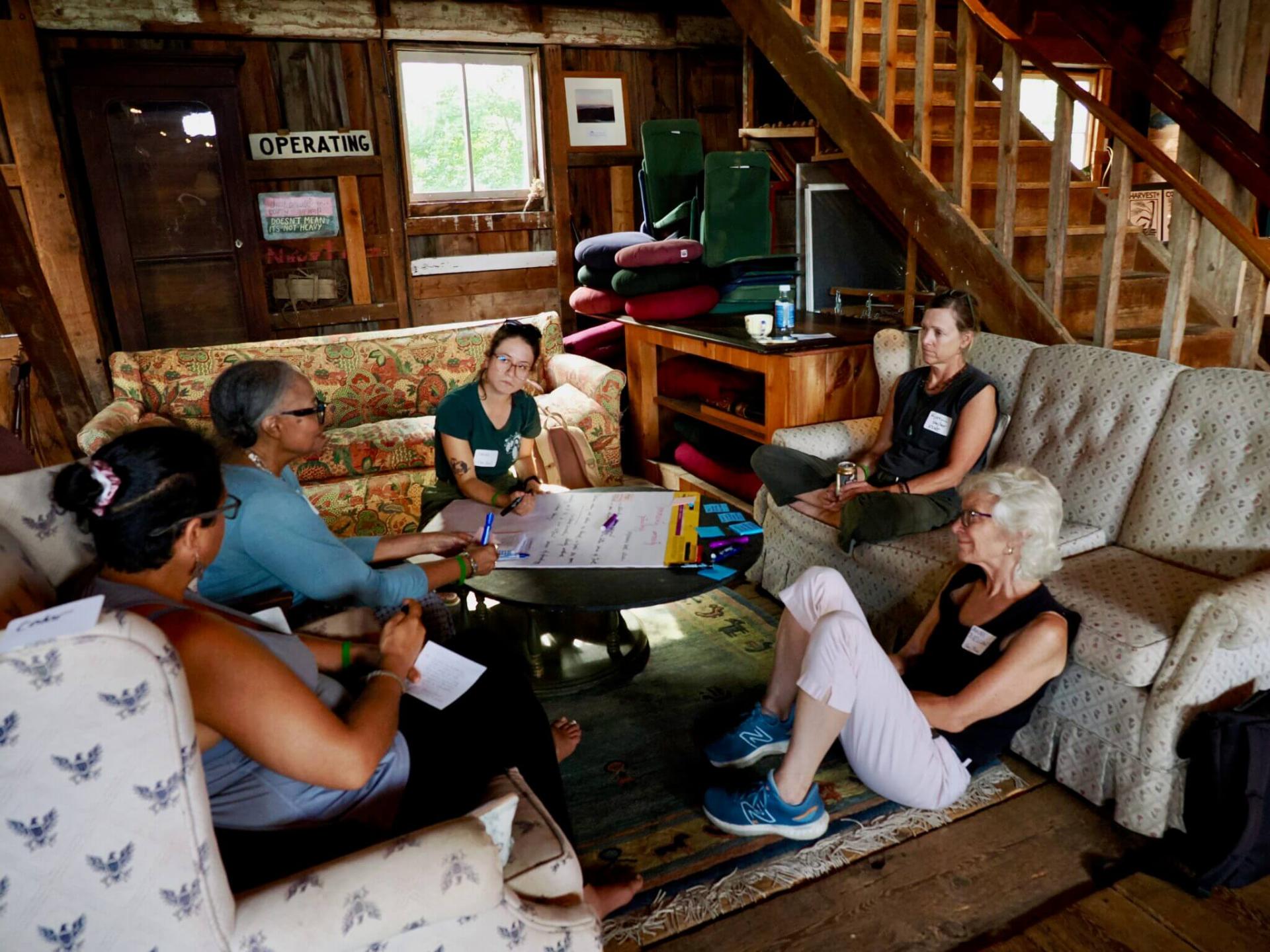 Participants meet in the barn at Knoll Farm for a breakout session.