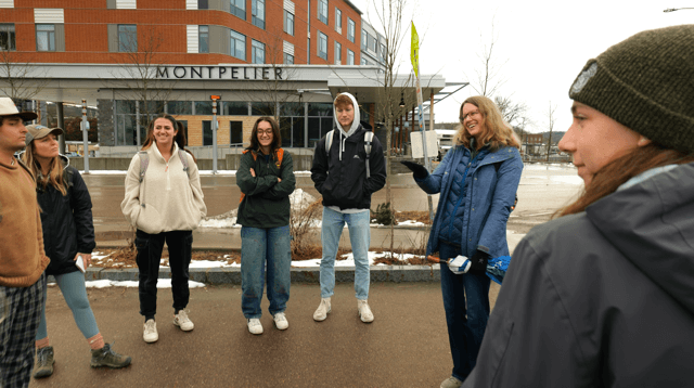 Students standing around in Montpelier on a site visit