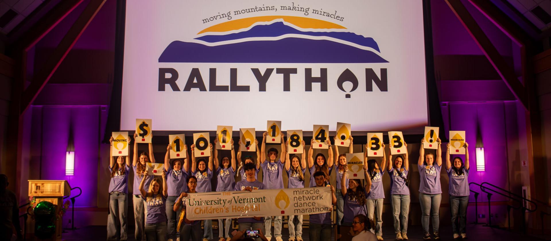 Rallython students pose with their total fundraising amount for 2025 at the end of the main event