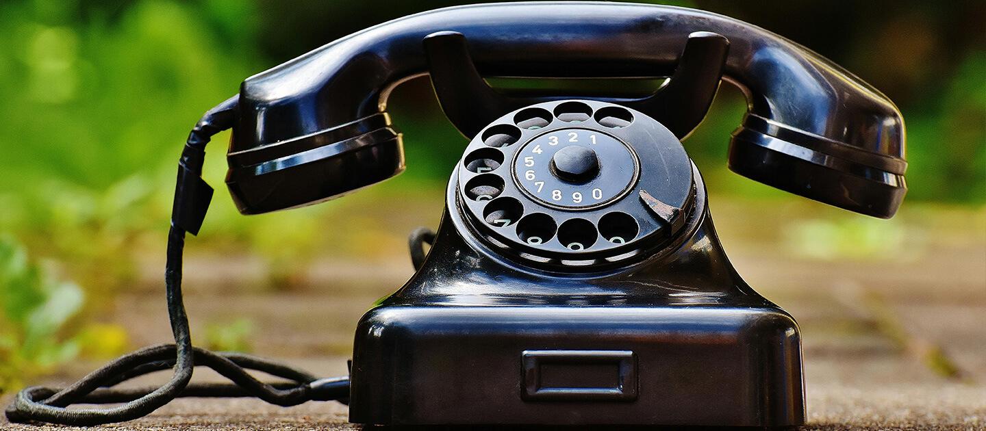 an old rotary phone outdoors