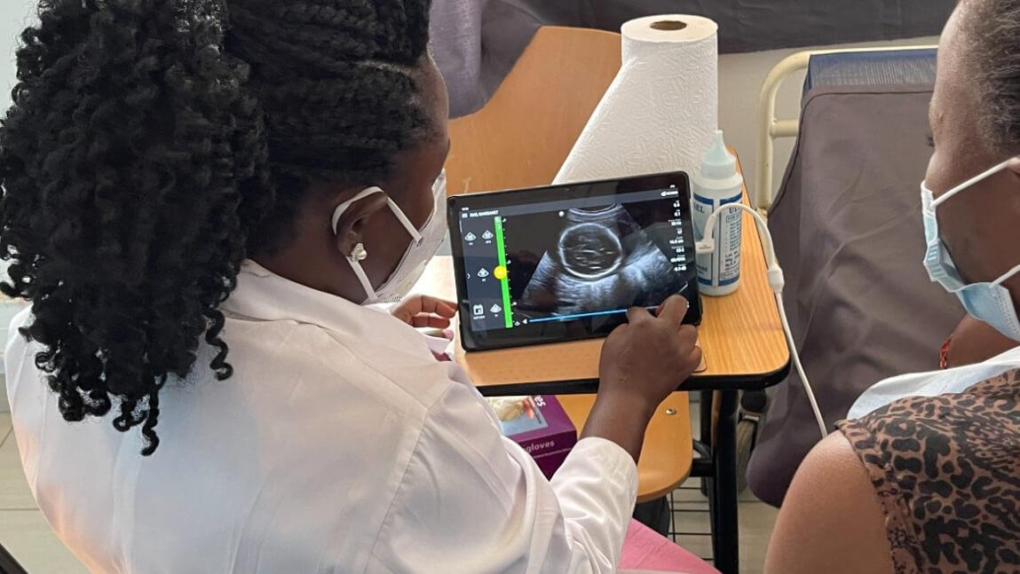 Clinician looking at a ultrasound image