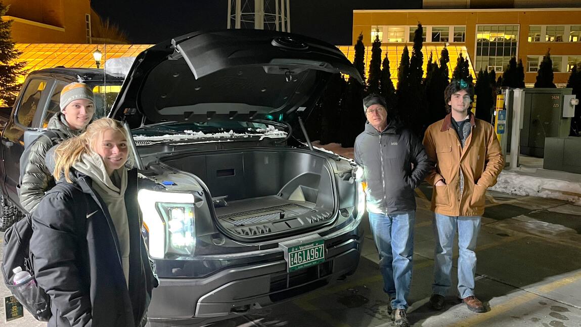 Students inspecting new Ford Lightning electric truck