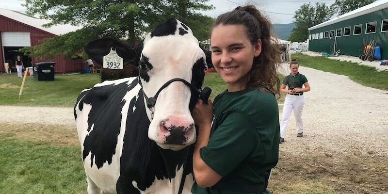 Girl with cow.